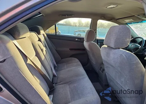 2002 Toyota Camry Le from USA, damaged, VIN 4T1BE30K92U065417